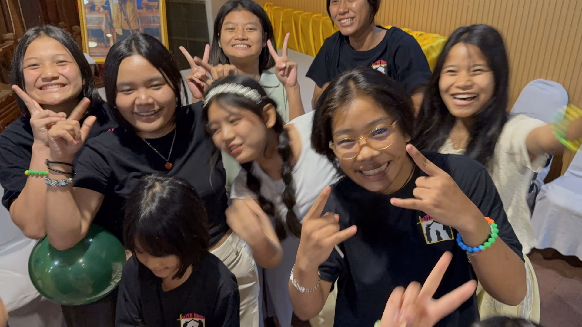 Faith House girls cheering after winning a game